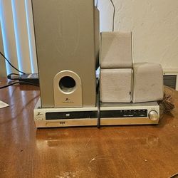 DVD player and surround sound system. $35.00