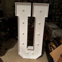 4-foot tall white marquee letter "U"