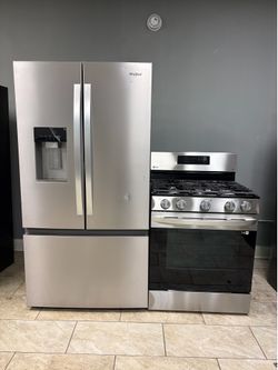 Brand new Whirlpool counter depth refrigerator &. LG 5 burner gas range.