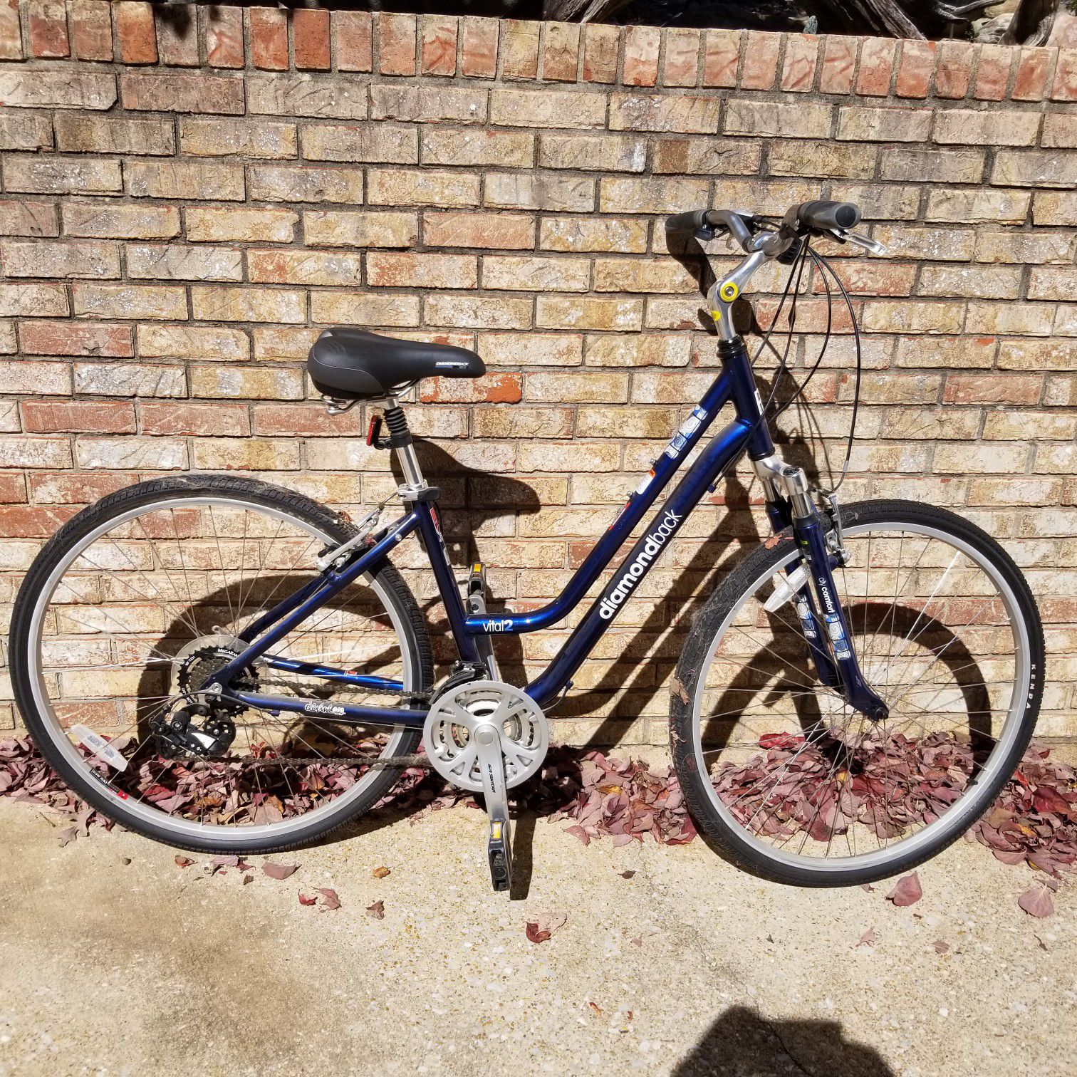 Two diamondback vital 2 bicycles for sale and 2 bike racks