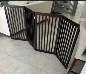 Dog gates (2) stained brown and gray
