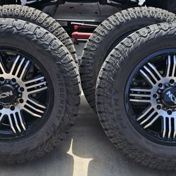 8 Lugs 20' Rims & New Tires 