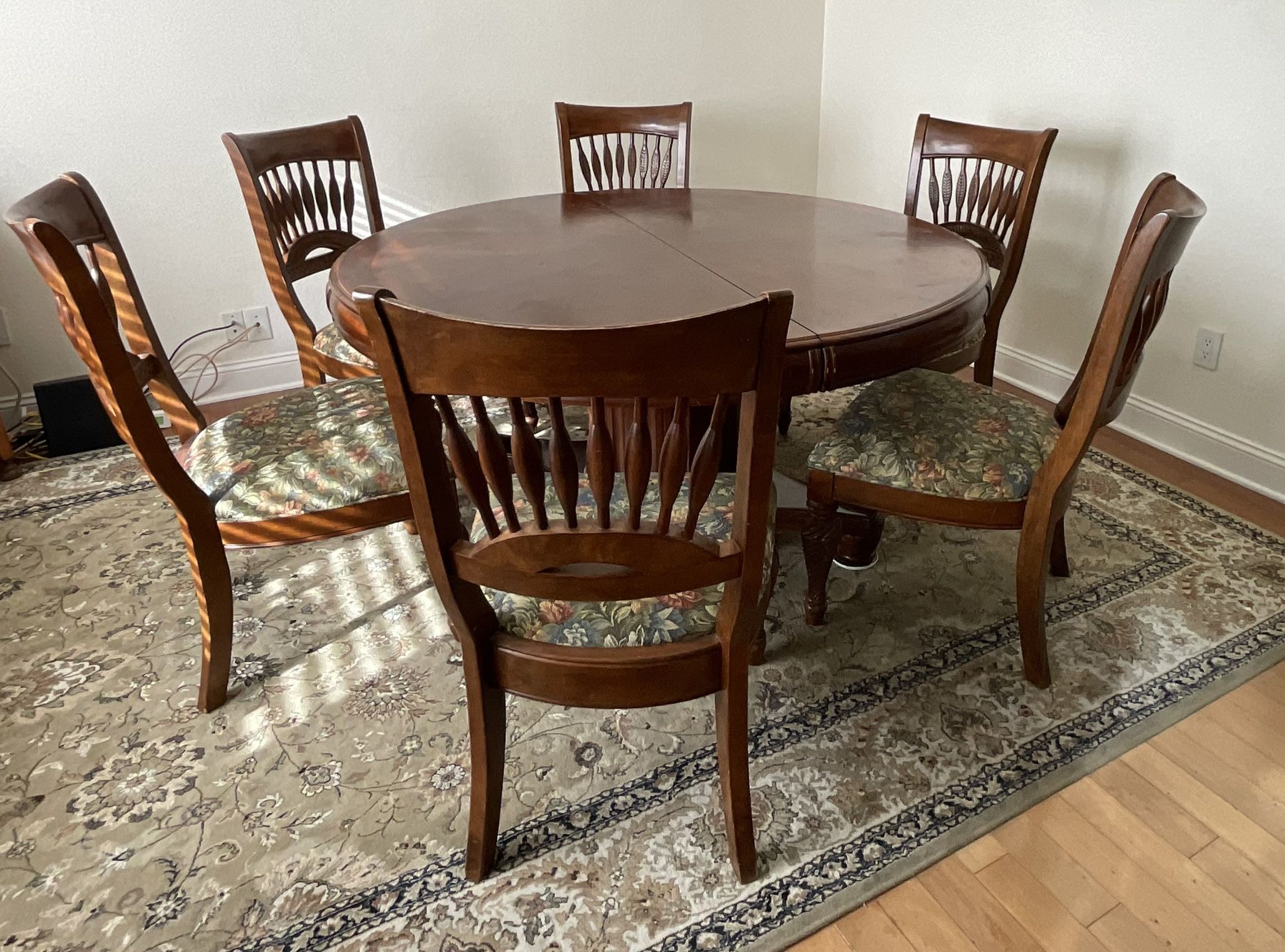 Round Dining Table With 6 Upholstered Chairs Plus Additional Leaf Insert
