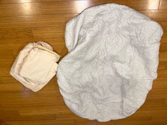 Full size mattress cover and cream color sheet set