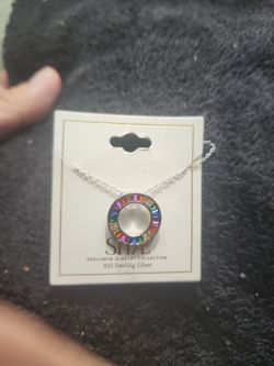 Brand new sterling silver chain and Jewel pendant $50. firm