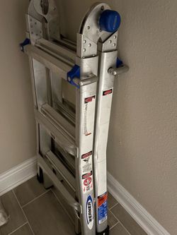 Werner MT-13 Multi-Position Aluminum Ladder – 13 ft maximum reach, 300 lb Type IA duty rating. Folds into multiple configurations (step ladder, extens