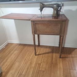 Early 1900s Antique New Home Sewing Machine Cabinet Table