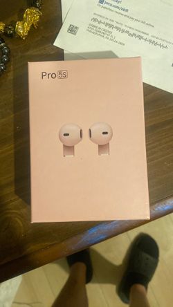 Wireless earphones, pink, white, and black Wireless earphones, pink, white, and black