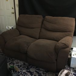 Brown sofa double recliner