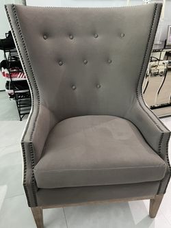 Tan Wingback Lillian Chair. Pet free smoke free home.