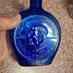 Rare cobalt blue glass rotary club, 75th anniversary bottle