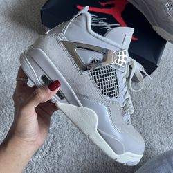 Jordan 4 Frozen Moments 
