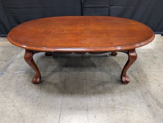 Rich Cherry Wood Oval Coffee Table with Curved Legs
