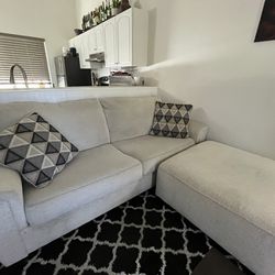 Couch, Pillows, And Large Ottoman 