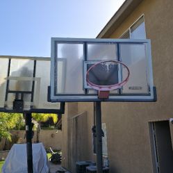 Used Spalding And LifeTine Basketball Stands