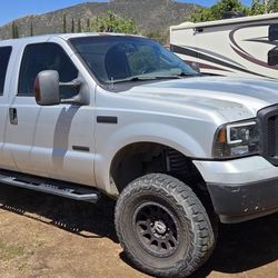06 FORD F350 4X4 DIESEL LARIAT