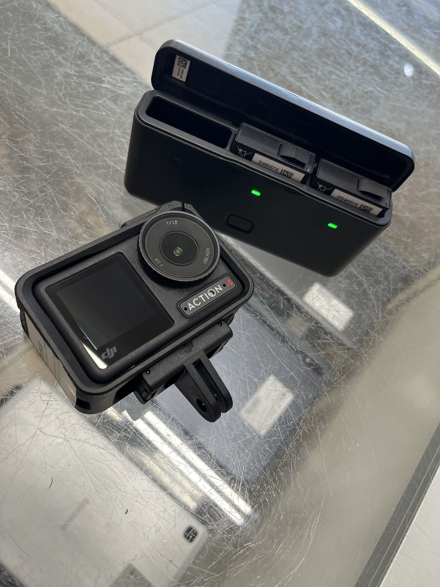 DJI ACTION GO PRO 4 With 3 BATT PACK Selling Cheap Like New