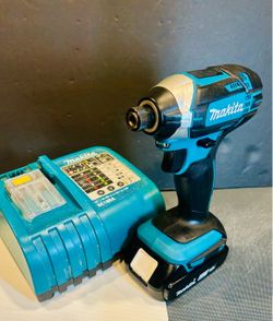 Like New MAKITA IMPACT DRIVER w/ 2.0 AH Battery & Charger, All items work great.