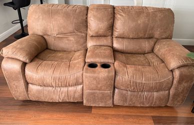Brown Sofa and love seat and great like new condition