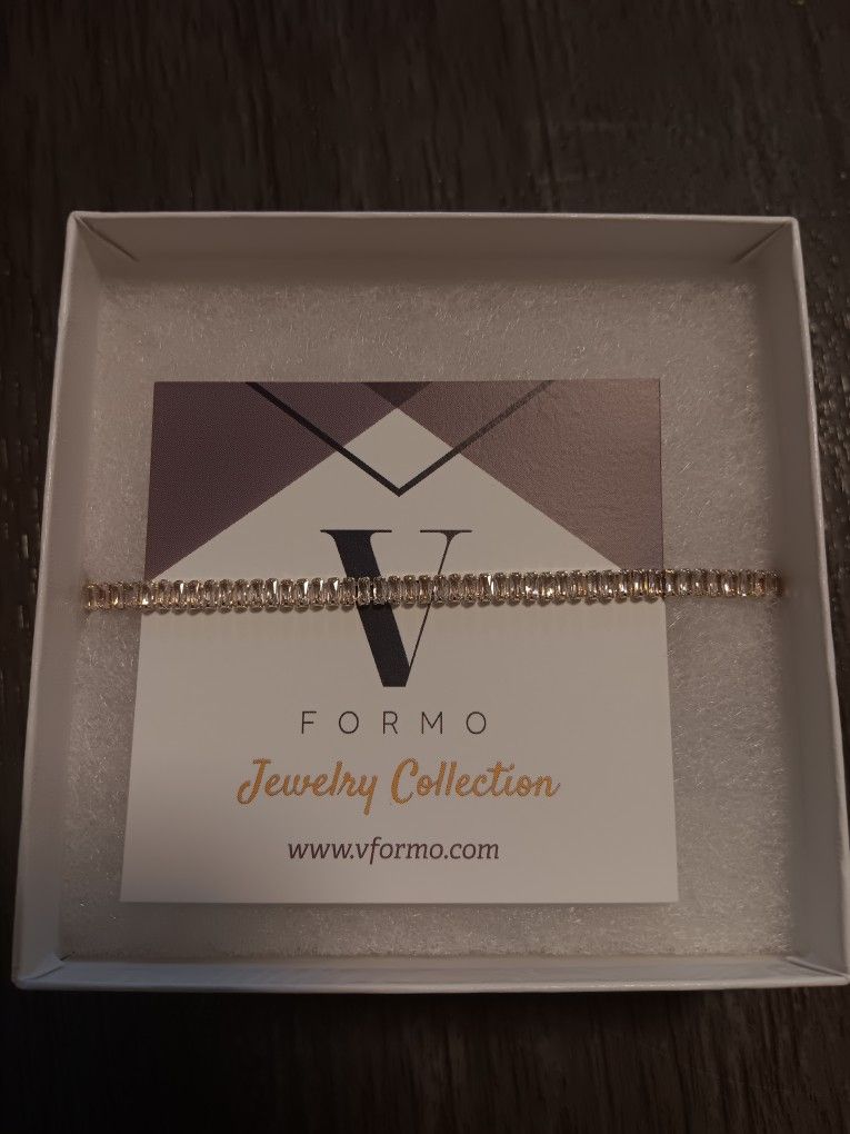 The jewelry piece in the image is a bracelet from the VFormo Jewelry Collection