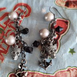 Disney Pirates of the Caribbean dangle skull earrings