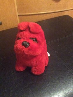 Stuffed animal red dog