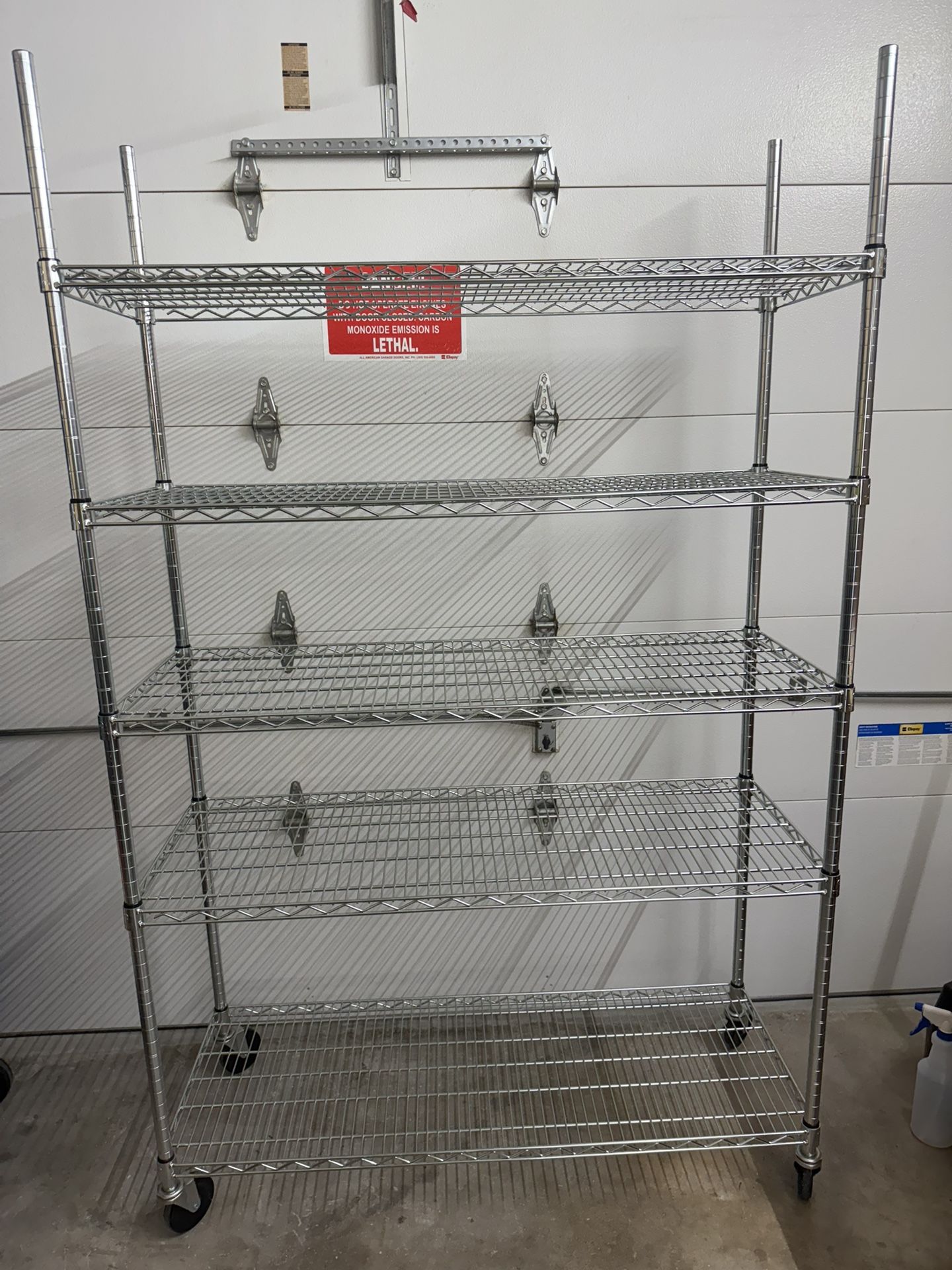 Harley Used All Crome 18” Deep X 48” Wide X 74” Height With 6 Adjustable Shelves With Casters.(CASH ONLY).