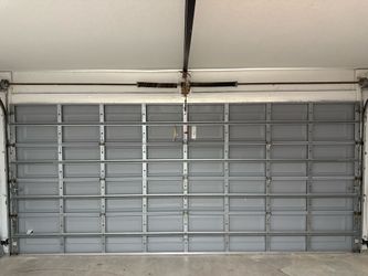 Garage Door Broken Spring Opener Off Track Adjustment Replace And Parts