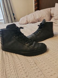 Gucci high tops sneakers.