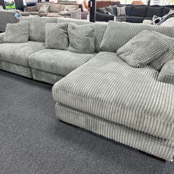 New 3 Pcs Lindyn Sectional. Ashley Furniture Best Selling Sectional. Delivery & Set Up Available. We Finance 