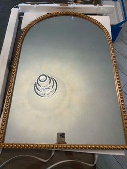 Gold mirror