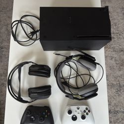 XBOX Series X with accessories and controllers.  