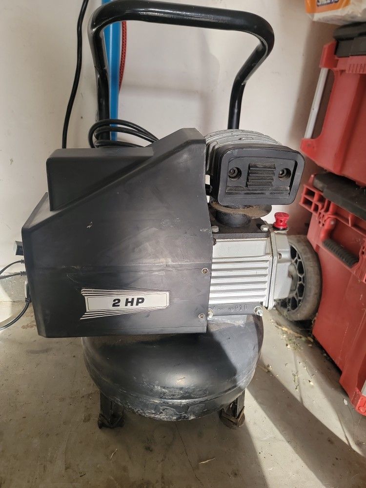 Central Pneumatic 2 HP twin tank air compressor