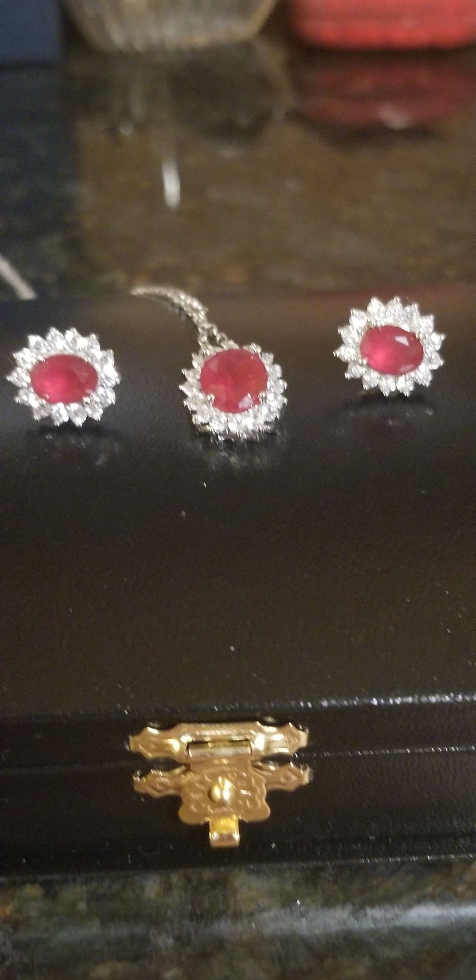 STERLING SILVER SET WITH RUBYS