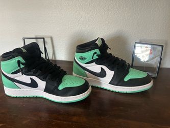 Air Jordan 1 Retro OG High in the Green Glow colorway. Clean black, white, and green design with the classic Jordan 1 look. Easy to match and great fo