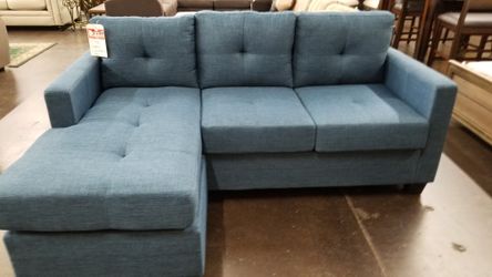 A small blue sofa chaise sectional for tight space