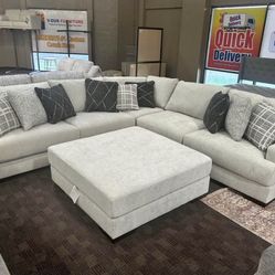 Deep Comfy Grey Sectional And Pillows 