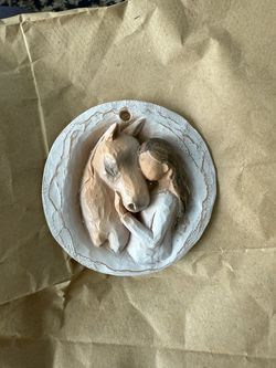 Girl and horse ornament