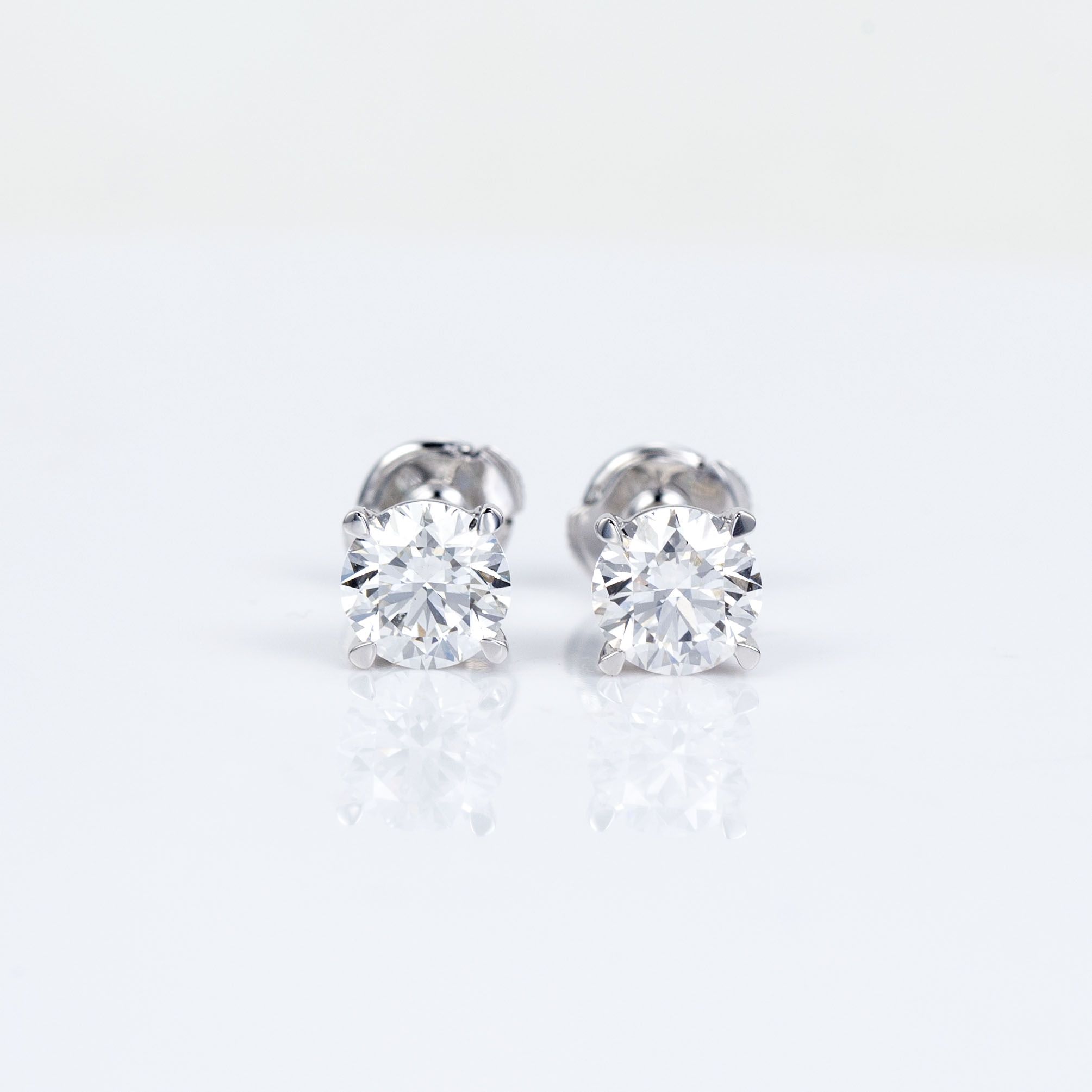 2.00ctw diamond 💎 stud earrings (1+1) F/Vs1, 18kt white gold martini 🍸 setting