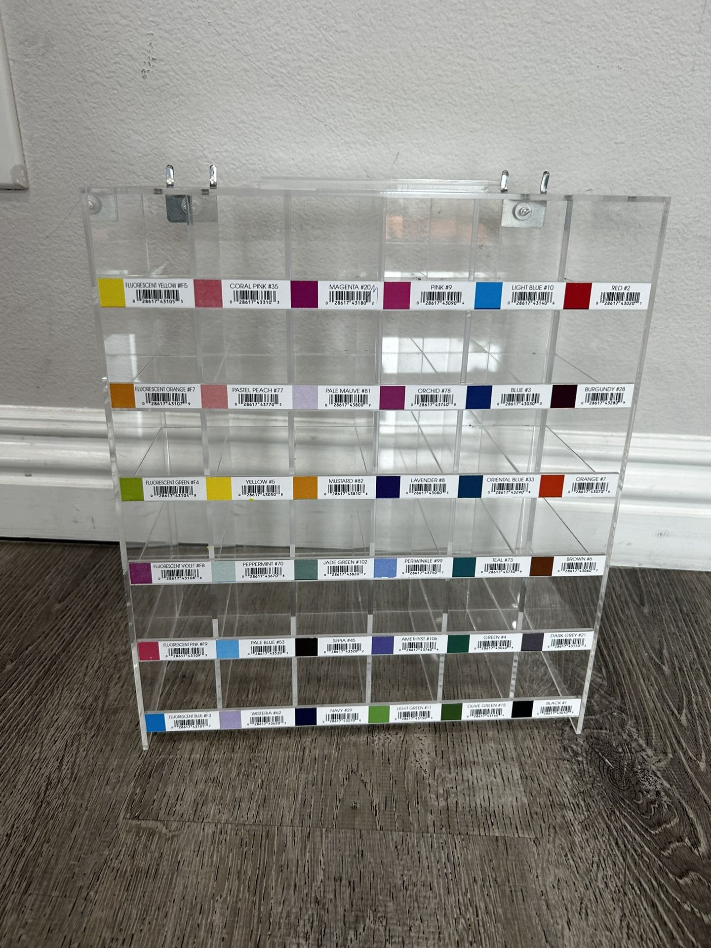 Organizer Acrylic Labeled With Colors. 