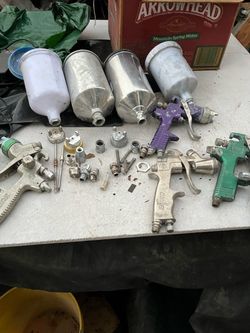 Paint sprayer guns