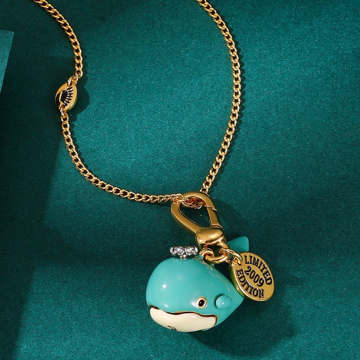 Stylish Juicy enamel openable whale pendant, black puppy and blue whale necklace pendant, suitable as a women's accessory.