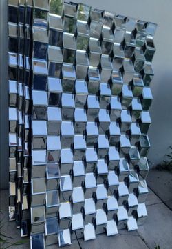 Set of 4 Ziggy decorative mirrors with a geometric design. They are considerably heavy. Assistance is required to transport them.