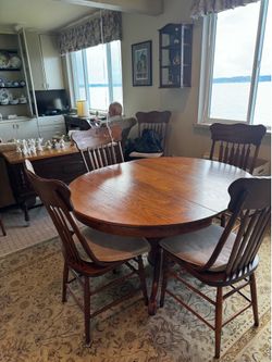 Antique solid oak table with 6 chairs
