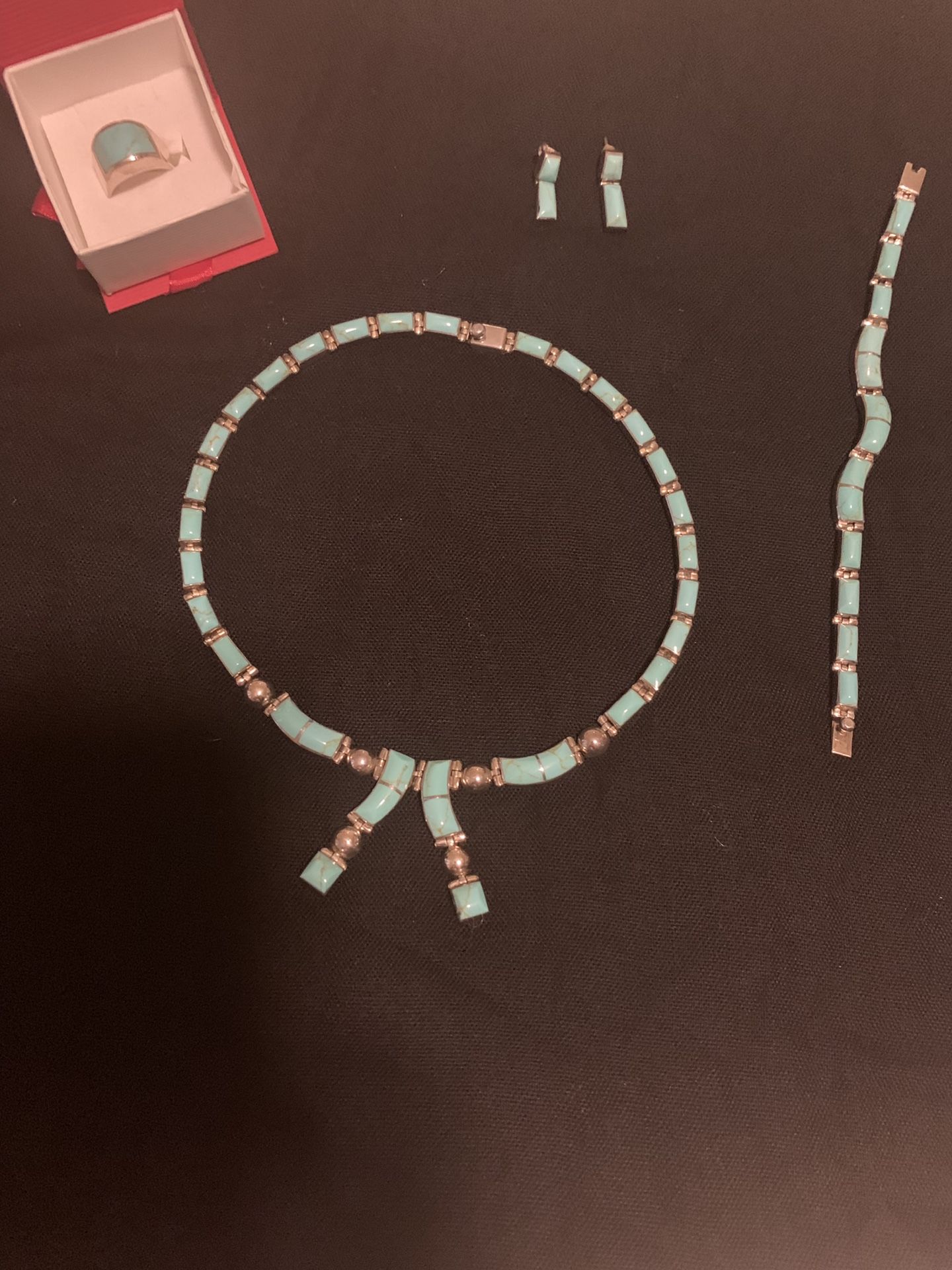 Turquoise and silver jewelry set.