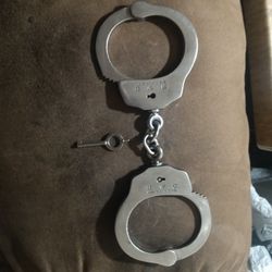 Vintage H.W.C. Real Police Stainless Steel Handcuffs.