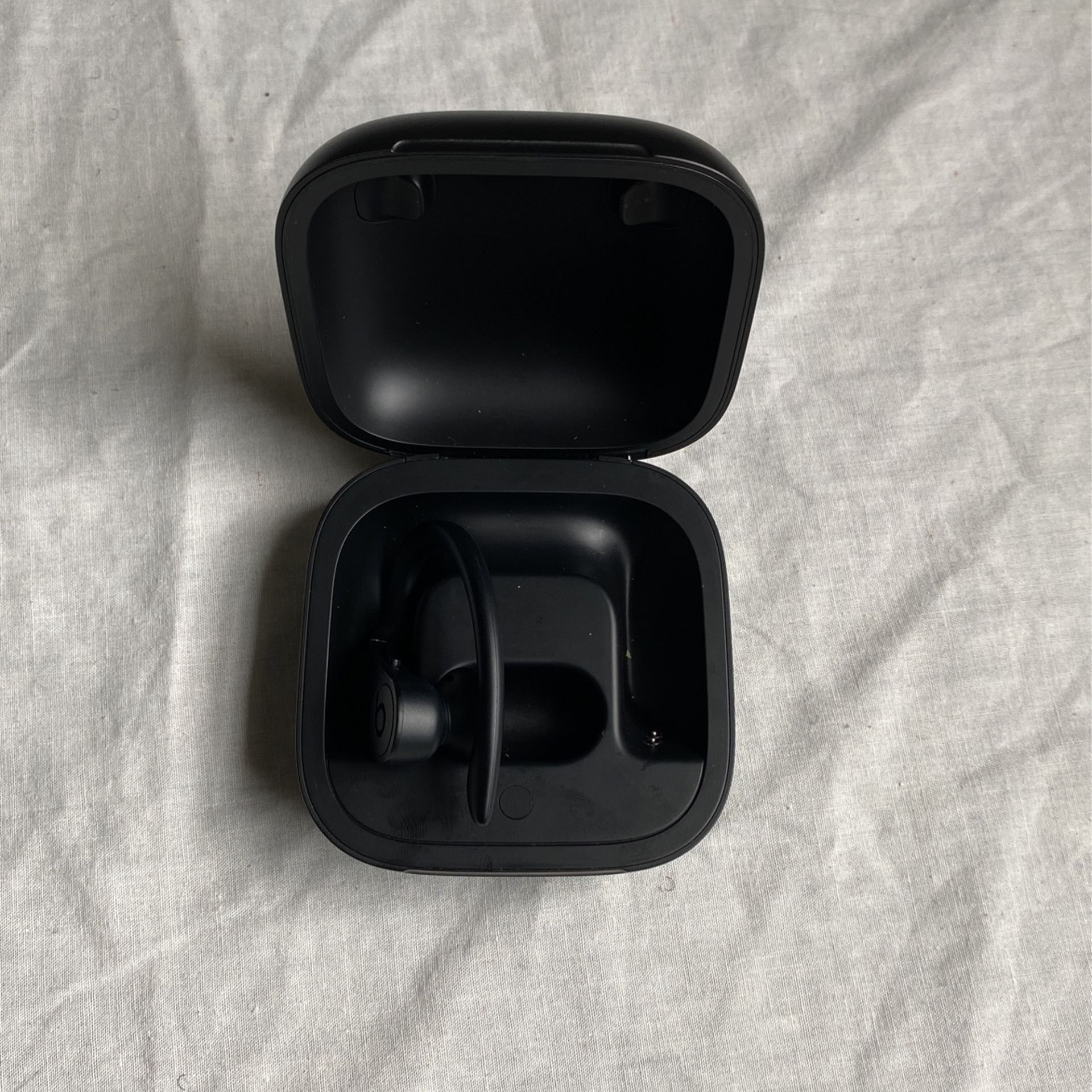 Left Side PowerBeats Pro With Charging Case