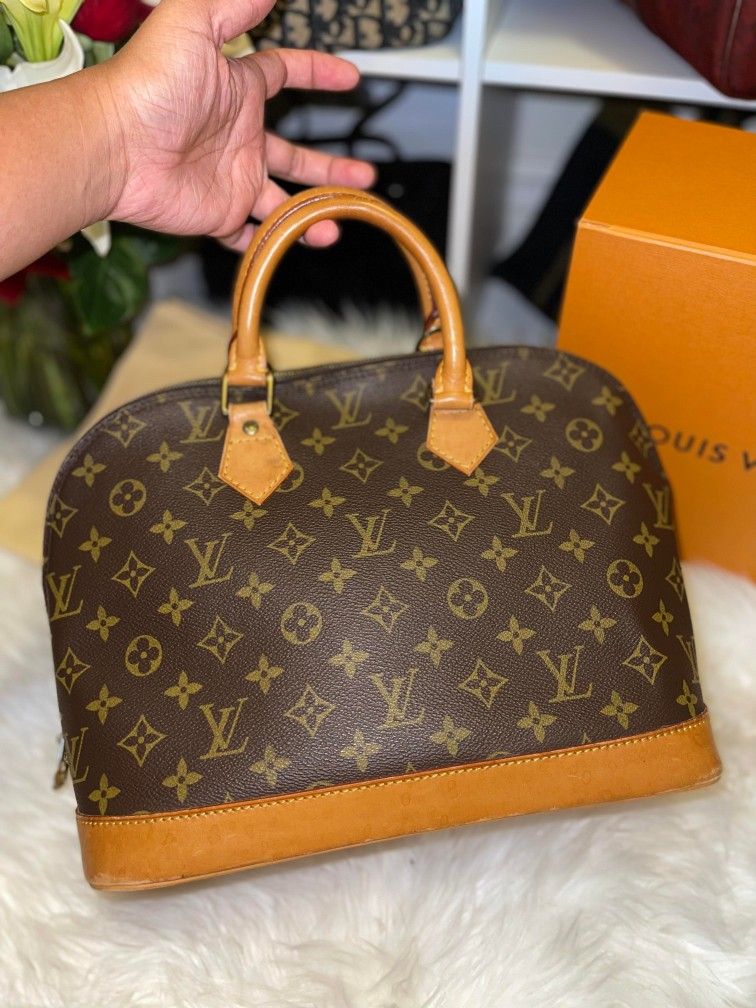 Authentic LV Alma Monogram Bag