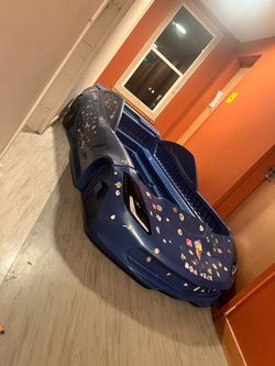 Blue race car bed frame