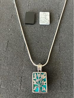 Vintage Silpada, three-piece necklace featuring turquoise, onyx and a white stone